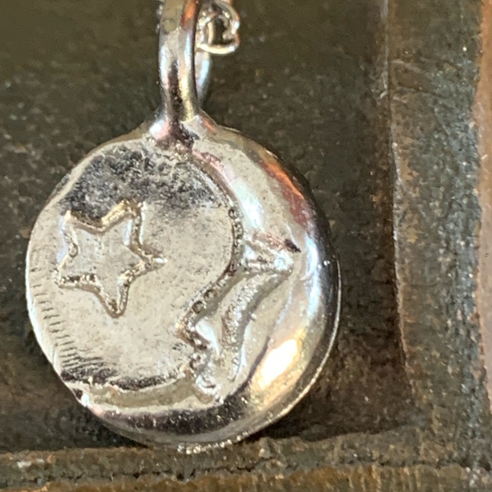 - Peruvian inspired moon face charm pendant